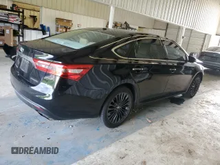 2016 Toyota Avalon Limited with VIN 4T1BK1EB9GU216124, listed as a Copart auction lot 54565495 with 192,136 mi miles and Salvage Title. Bid and sale history available at DreamBid. Image 3.