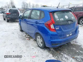 2020 Honda Fit LX z VIN 3HGGK5H43LM716911, wystawiony jako IAAI lot #41410480 z przebiegiem 71 983 mil mil oraz . Historia ofert i sprzedaży dostępna na DreamBid. Obrazek 3.