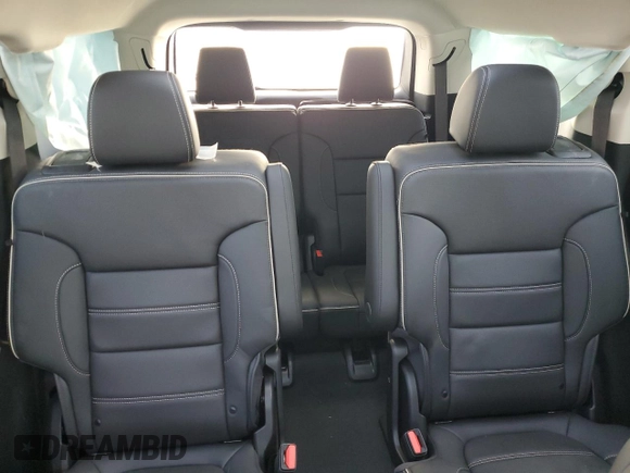 2023 GMC Acadia Denali with VIN 1GKKNPLS1PZ247635, listed as a Copart auction lot 84953044 with 12,869 mi miles and Salvage title. Bid and sale history available at DreamBid. Image 10.