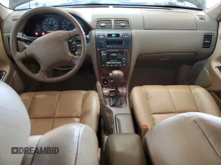 1999 Nissan Maxima GXE z VIN JN1CA21D0XT808755, wystawiony jako Copart lot #49693685 z przebiegiem 63 389 mil mil oraz Szkoda całkowita • Salvage title. Historia ofert i sprzedaży dostępna na DreamBid. Obrazek 8.
