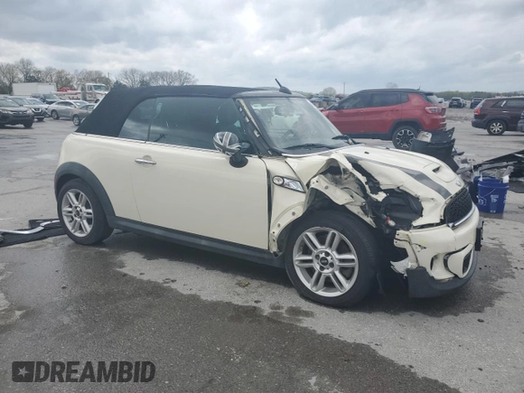 2011 MINI Convertible S with VIN WMWZP3C54BTX83253, listed as a Copart auction lot 49879485 with Not Provided miles and Salvage Title. Bid and sale history available at DreamBid. Image 4.
