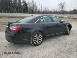 2013 Ford Taurus Limited with VIN 1FAHP2F89DG131731, listed as a Copart auction lot 48609065 with 116,975 mi miles and Salvage title. Bid and sale history available at DreamBid. Image 3.