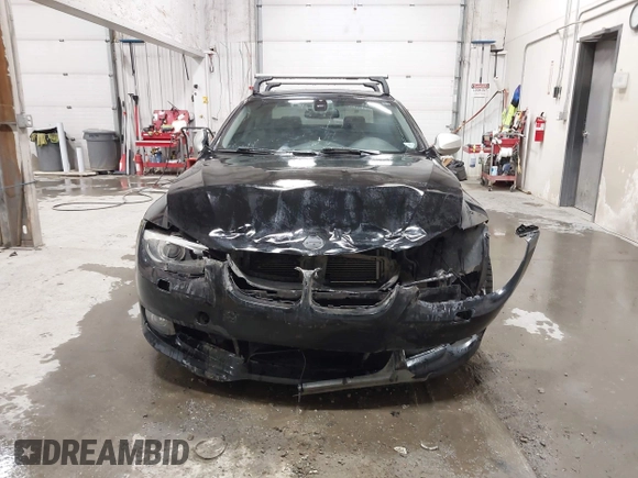 2011 BMW 3 Series 335i xDrive with VIN WBAKF9C53BE247177, listed as a IAAI auction lot 41973181 with 113,986 mi miles. Bid and sale history available at carsss.com. Image 12.