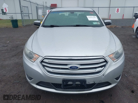 2014 Ford Taurus Limited with VIN 1FAHP2F81EG123933, listed as a IAAI auction lot 41843301 with 111,629 mi miles. Bid and sale history available at carsss.com. Image 12.