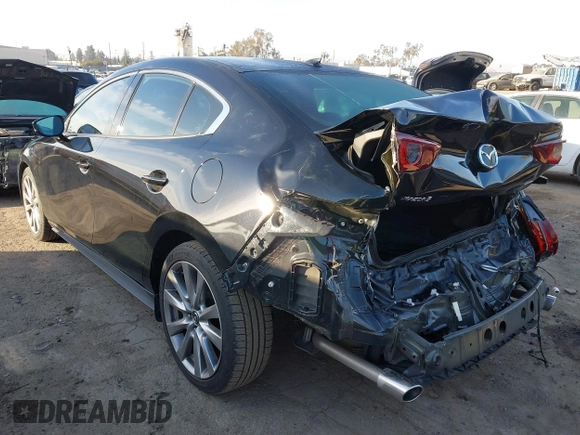 2020 Mazda 3 Premium with VIN 3MZBPAEM2LM124405, listed as a IAAI auction lot 41478818 with 72,551 mi miles and . Bid and sale history available at DreamBid. Image 3.
