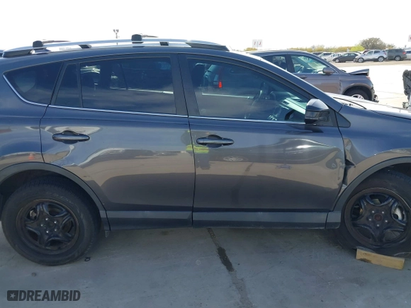 2018 Toyota RAV4 LE with VIN 2T3ZFREV4JW412661, listed as a IAAI auction lot 41781229 with 140,131 mi miles. Bid and sale history available at carsss.com. Image 13.