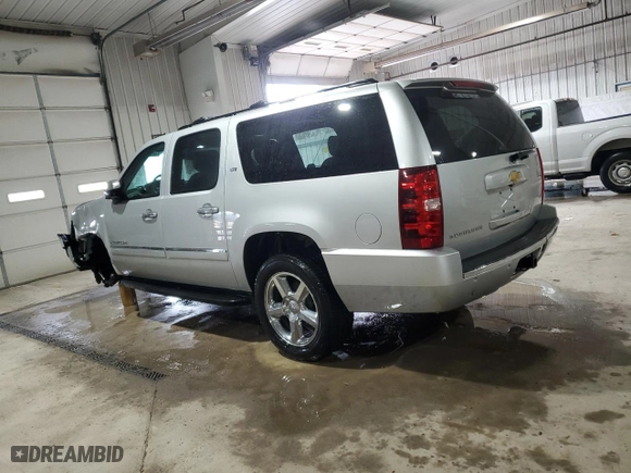 2014 Chevrolet Suburban LTZ with VIN 1GNSKKE75ER162737, listed as a Copart auction lot 43692485 with 129,393 mi miles and Salvage Title. Bid and sale history available at carsss.com. Image 2.