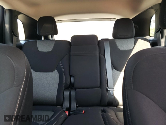2015 Jeep Cherokee Sport z VIN 1C4PJLAB4FW731128, wystawiony jako Copart lot #56358915 z przebiegiem 100 455 mil mil oraz Czysty tytuł • Clean title. Historia ofert i sprzedaży dostępna na DreamBid. Obrazek 10.