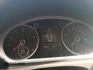2014 Volkswagen CC R-Line with VIN WVWBN7ANXEE527633, listed as a Copart auction lot 67687694 with 84,561 mi miles and Salvage Title. Bid and sale history available at carsss.com. Image 9.