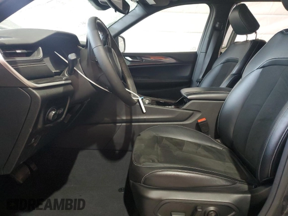 2023 Jeep Grand Cherokee Altitude with VIN 1C4RJHAGXP8701574, listed as a Copart auction lot 53596745 with 26,740 mi miles and Salvage title. Bid and sale history available at DreamBid. Image 7.