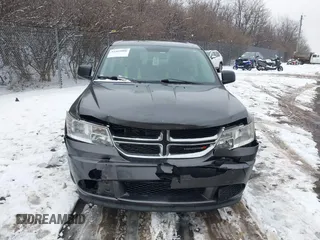 2014 Dodge Journey SE with VIN 3C4PDCAB0ET182376, listed as a IAAI auction lot 41569006 with 106,024 mi miles and . Bid and sale history available at DreamBid. Image 12.