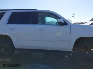 2019 Chevrolet Tahoe LT with VIN 1GNSKBKC7KR307869, listed as a IAAI auction lot 41833834 with 127,949 mi miles. Bid and sale history available at carsss.com. Image 13.
