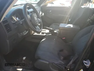 2012 Jeep Liberty Sport with VIN 1C4PJLAK4CW110404, listed as a Copart auction lot 47061095 with 216,103 mi miles and Salvage Title. Bid and sale history available at carsss.com. Image 7.