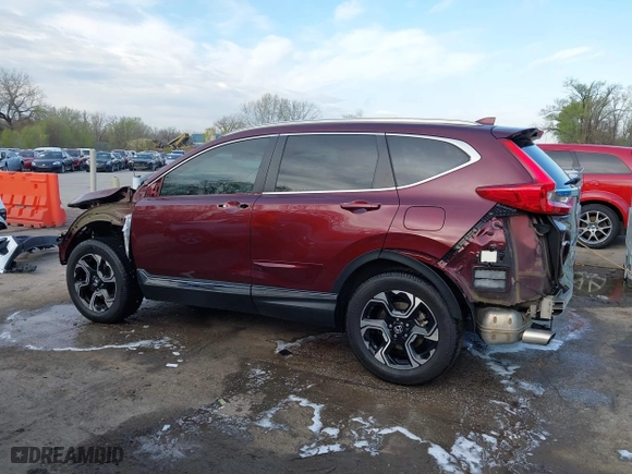 2017 Honda CR-V Touring with VIN 5J6RW2H95HL074264, listed as a IAAI auction lot 41974804 with 94,923 mi miles. Bid and sale history available at carsss.com. Image 15.