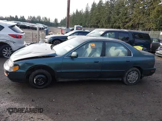 1997 Honda Accord Value with VIN 1HGCD5686VA189722, listed as a IAAI auction lot 41494380 with 205,514 mi miles and . Bid and sale history available at carsss.com. Image 14.