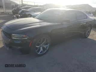 2015 Dodge Charger SXT z VIN 2C3CDXHG6FH916332, wystawiony jako Copart lot #78749113 z przebiegiem 87 207 mil mil oraz Szkody całkowita. Historia ofert i sprzedaży dostępna na DreamBid. Obrazek 1.