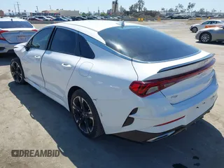 2022 Kia K5 GT-Line z VIN 5XXG64J28NG112507, wystawiony jako IAAI lot #41998172 z przebiegiem 43 915 mil mil oraz . Historia ofert i sprzedaży dostępna na DreamBid. Obrazek 3.