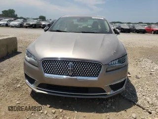 2020 Lincoln MKZ Hybrid Reserve z VIN 3LN6L5LUXLR606340, wystawiony jako Copart lot #65235544 z przebiegiem Nie podano mil oraz Szkoda całkowita • Salvage title. Historia ofert i sprzedaży dostępna na DreamBid. Obrazek 5.