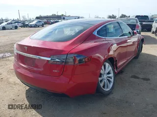 2018 Tesla Model S 75D with VIN 5YJSA1E26JF259651, listed as a IAAI auction lot 41690804 with Not Provided miles and . Bid and sale history available at DreamBid. Image 4.