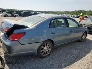 2005 Toyota Avalon XL z VIN 4T1BK36B95U005898, wystawiony jako Copart lot #54469595 z przebiegiem 176 901 mil mil oraz Szkoda całkowita • Salvage title. Historia ofert i sprzedaży dostępna na DreamBid. Obrazek 3.