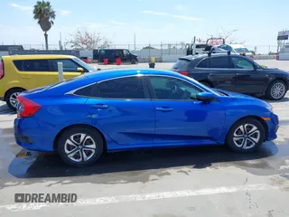 2017 Honda Civic LX z VIN 2HGFC2F56HH516730, wystawiony jako IAAI lot #42130963 z przebiegiem 119 236 mil mil oraz . Historia ofert i sprzedaży dostępna na DreamBid. Obrazek 13.