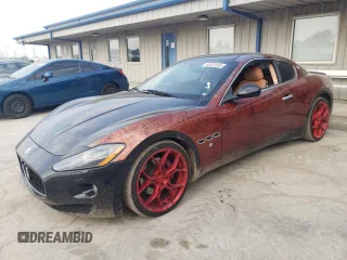 2009 Maserati GranTurismo z VIN ZAMGJ45A790044249, wystawiony jako Copart lot #60431895 z przebiegiem 37 955 mil mil oraz Czysty tytuł • Clean title. Historia ofert i sprzedaży dostępna na DreamBid. Obrazek 1.