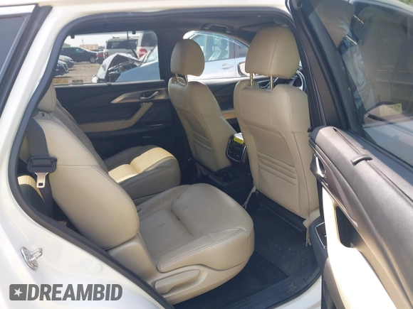 2020 Mazda CX-9 Grand Touring with VIN JM3TCBDY3L0410674, listed as a IAAI auction lot 42389157 with 130,519 mi miles and . Bid and sale history available at DreamBid. Image 8.