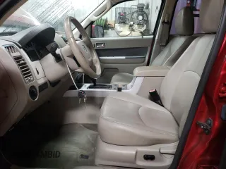 2009 Mercury Mariner Premier z VIN 4M2CU87G09KJ06396, wystawiony jako Copart lot #81784034 z przebiegiem 95 923 mil mil oraz Szkoda całkowita • Salvage title. Historia ofert i sprzedaży dostępna na DreamBid. Obrazek 7.