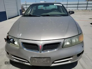 2003 Pontiac Bonneville SE z VIN 1G2HX52KX34177635, wystawiony jako Copart lot #60222734 z przebiegiem 303 653 mil mil oraz Szkoda całkowita • Salvage title. Historia ofert i sprzedaży dostępna na DreamBid. Obrazek 5.
