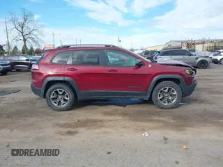2019 Jeep Cherokee Trailhawk Elite with VIN 1C4PJMBX6KD378848, listed as a IAAI auction lot 40754408 with 52,901 mi miles. Bid and sale history available at carsss.com. Image 12.