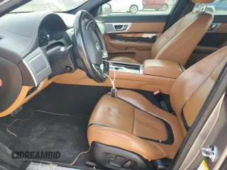 2012 Jaguar XF Portfolio with VIN SAJWA0HB9CLS28855, listed as a Copart auction lot 51770025 with 0 mi miles and Salvage Title. Bid and sale history available at carsss.com. Image 7.