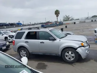 2012 Ford Escape XLT with VIN 1FMCU9D74CKB79211, listed as a IAAI auction lot 42464491 with 144,757 mi miles and . Bid and sale history available at DreamBid. Image 13.