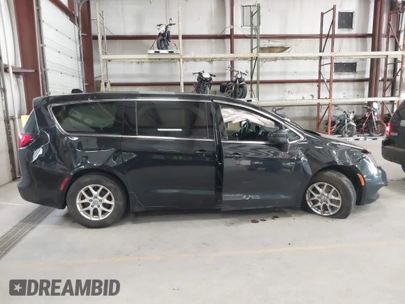 2017 Chrysler Pacifica Touring with VIN 2C4RC1DGXHR585294, listed as a IAAI auction lot 41971914 with 153,028 mi miles and . Bid and sale history available at DreamBid. Image 12.