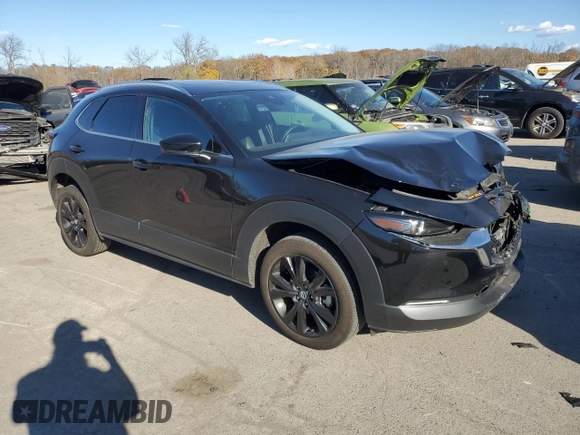 2021 Mazda CX-30 Premium Plus with VIN 3MVDMBEY8MM310933, listed as a Copart auction lot 78295304 with 32,556 mi miles and Salvage Title. Bid and sale history available at DreamBid. Image 4.