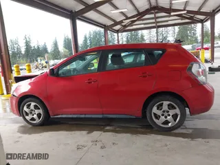 2009 Pontiac Vibe w/1SA with VIN 5Y2SP67859Z430411, listed as a IAAI auction lot 41980141 with 140,676 mi miles. Bid and sale history available at carsss.com. Image 14.