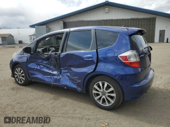 2013 Honda Fit Sport with VIN JHMGE8H56DC068174, listed as a Copart auction lot 50687815 with 106,629 mi miles and Salvage Title. Bid and sale history available at carsss.com. Image 2.