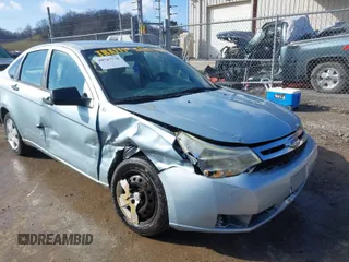 2008 Ford Focus S with VIN 1FAHP34NX8W223229, listed as a IAAI auction lot 38747770 with 232,432 mi miles. Bid and sale history available at carsss.com. Image 1.