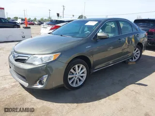 2012 Toyota Camry Hybrid XLE with VIN 4T1BD1FK0CU020723, listed as a IAAI auction lot 42031093 with 121,297 mi miles. Bid and sale history available at carsss.com. Image 17.