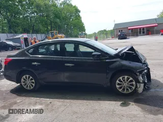 2018 Nissan Sentra SV z VIN 3N1AB7AP3JY254444, wystawiony jako IAAI lot #42303145 z przebiegiem 97 286 mil mil oraz . Historia ofert i sprzedaży dostępna na DreamBid. Obrazek 13.