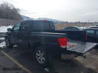 2010 Nissan Titan SE with VIN 1N6AA0EC7AN302682, listed as a IAAI auction lot 41619128 with 181,486 mi miles. Bid and sale history available at carsss.com. Image 3.
