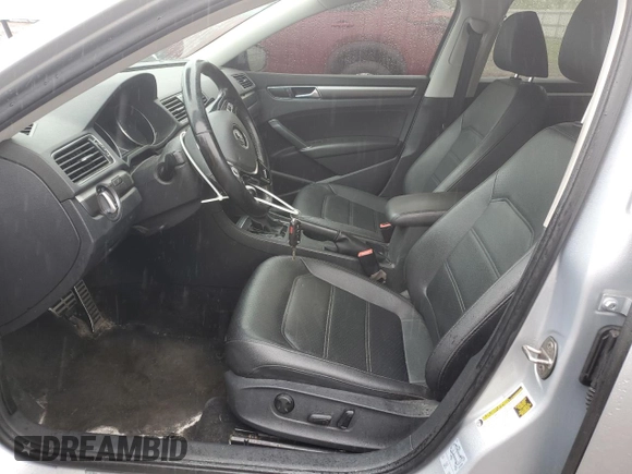 2018 Volkswagen Passat S z VIN 1VWAA7A31JC030768, wystawiony jako Copart lot #57269045 z przebiegiem 88 287 mil mil oraz Szkoda całkowita • Salvage title. Historia ofert i sprzedaży dostępna na DreamBid. Obrazek 7.