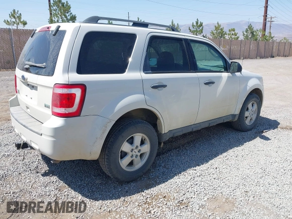 2011 Ford Escape XLT z VIN 1FMCU9DGXBKA93027, wystawiony jako IAAI lot #42712059 z przebiegiem 121 820 mil mil oraz . Historia ofert i sprzedaży dostępna na DreamBid. Obrazek 4.