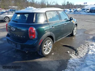 2013 MINI Cooper Countryman with VIN WMWZB3C57DWR35705, listed as a IAAI auction lot 41620080 with 197,884 mi miles. Bid and sale history available at carsss.com. Image 4.