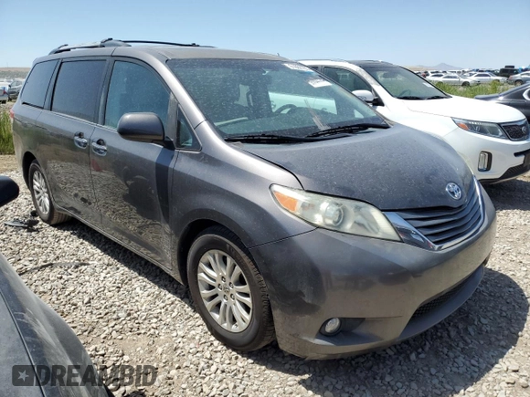 2011 Toyota Sienna XLE AAS with VIN 5TDYK3DCXBS134341, listed as a Copart auction lot 61602705 with 184,959 mi miles and Clean title. Bid and sale history available at DreamBid. Image 4.