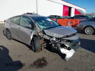 2020 Toyota Prius LE with VIN JTDKARFP6L3145576, listed as a IAAI auction lot 41009752 with 35,375 mi miles and . Bid and sale history available at DreamBid. Image 1.