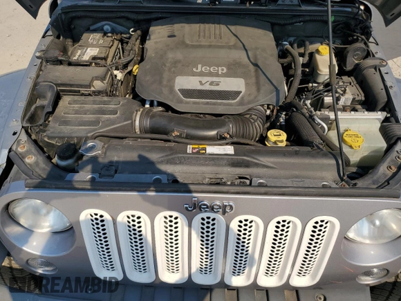 2014 Jeep Wrangler Unlimited Sahara with VIN 1C4HJWEG3EL130272, listed as a Copart auction lot 46860245 with 102,716 mi miles and Clean Title. Bid and sale history available at carsss.com. Image 12.