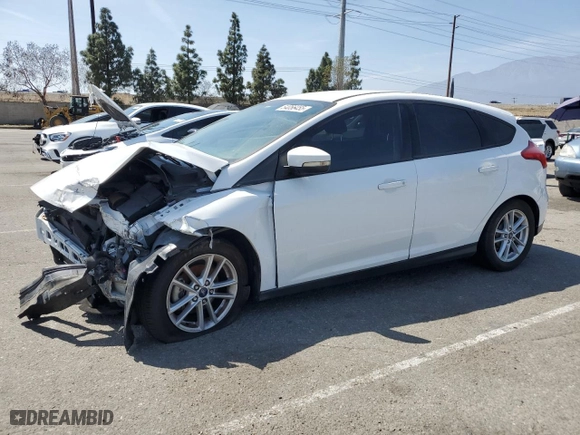 2017 Ford Focus SE with VIN 1FADP3K26HL223348, listed as a Copart auction lot 54056455 with 65,700 mi miles and Salvage Title. Bid and sale history available at carsss.com. Image 1.
