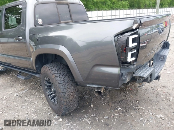 2017 Toyota Tacoma SR5 z VIN 3TMAZ5CN9HM044182, wystawiony jako IAAI lot #42116303 z przebiegiem 92 577 mil mil oraz . Historia ofert i sprzedaży dostępna na DreamBid. Obrazek 17.