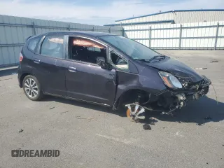 2013 Honda Fit Sport with VIN JHMGE8H57DC061007, listed as a Copart auction lot 52781015 with 176,667 mi miles and Clean Title. Bid and sale history available at carsss.com. Image 4.