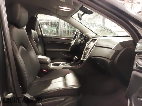 2014 Cadillac SRX with VIN 3GYFNAE34ES665630, listed as a IAAI auction lot 41315281 with 99,009 mi miles and . Bid and sale history available at DreamBid. Image 5.